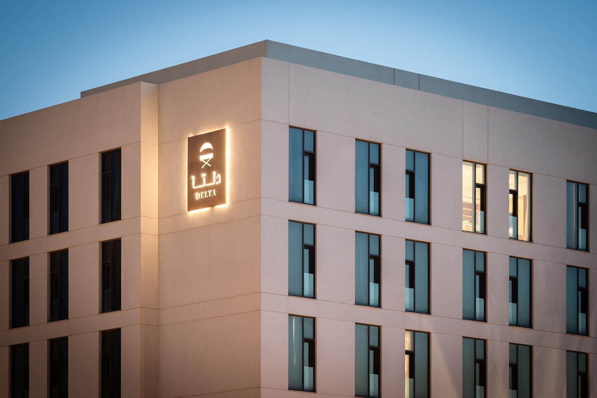 Delta Hotel Apartments Kuwait City Exterior photo The new building of the University of Applied Sciences and Medical University of Southern Schleswig-Flensburg