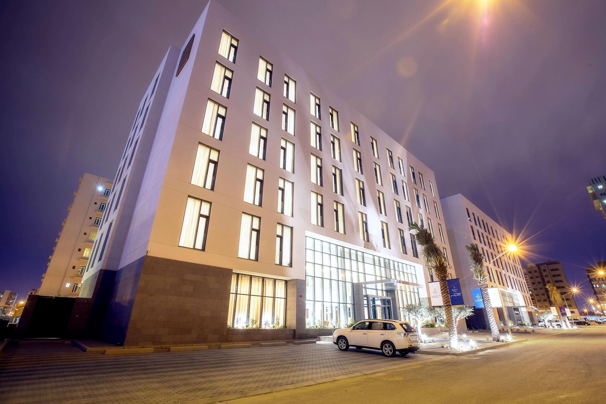 Delta Hotel Apartments Kuwait City Exterior photo The new library building